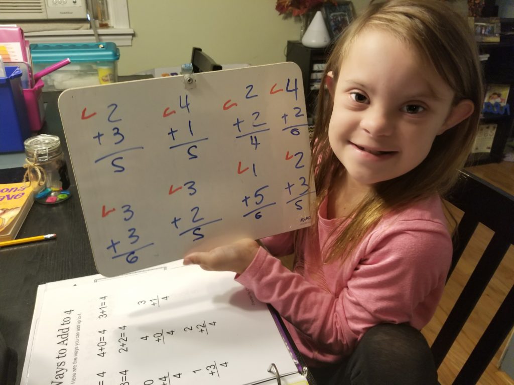 Big girl proud of her math skills!